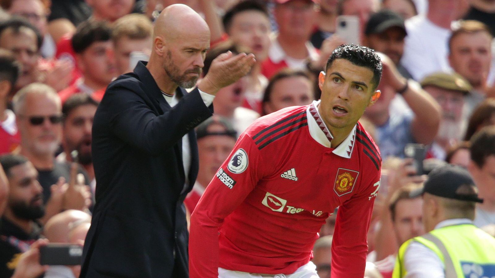 Man Utd striker Cristiano Ronaldo looks at Erik ten Hag