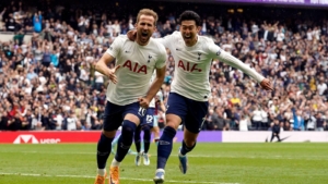 Tottenham boss Harry Kane celebrates scoring a goal with Son Heung-min