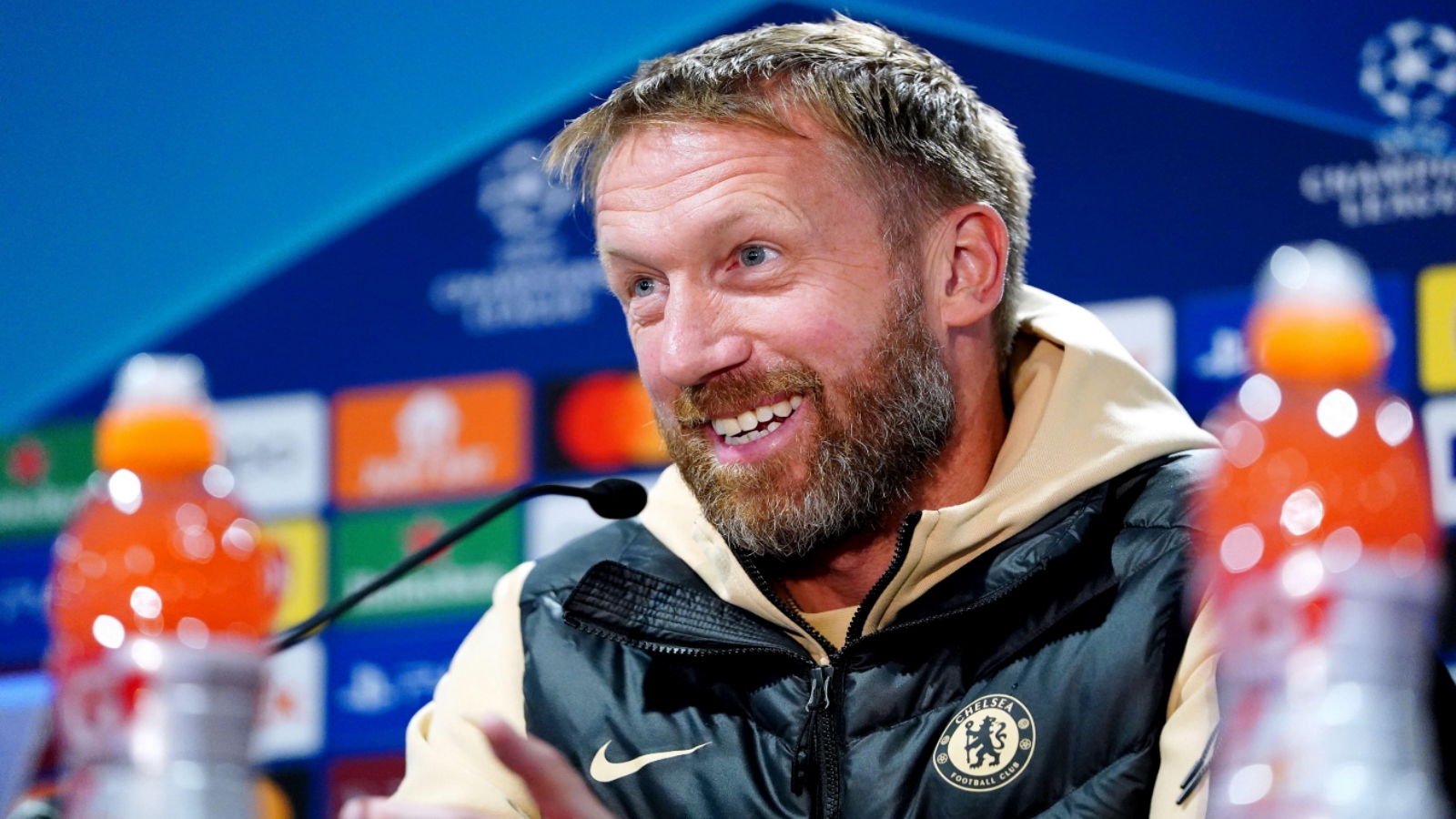 Chelsea manager Graham Potter smiles at a press conference after a Champions League game