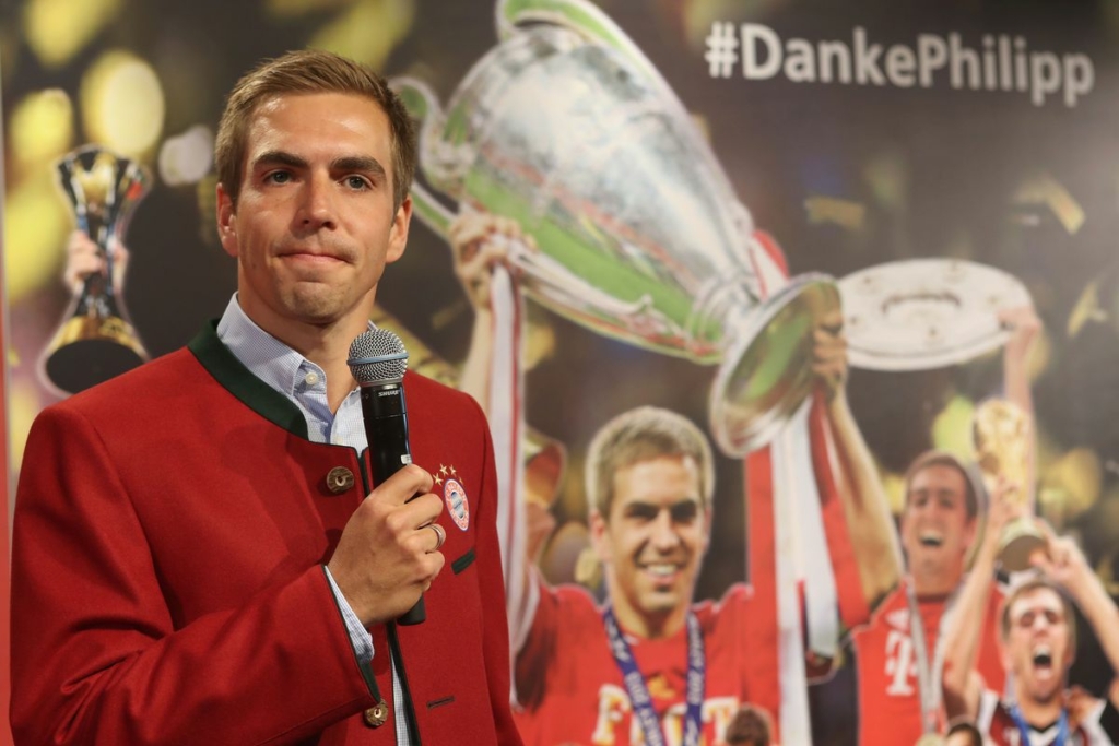 Philipp Lahm Hands Over Championship Trophy To FCB Erlebniswelt