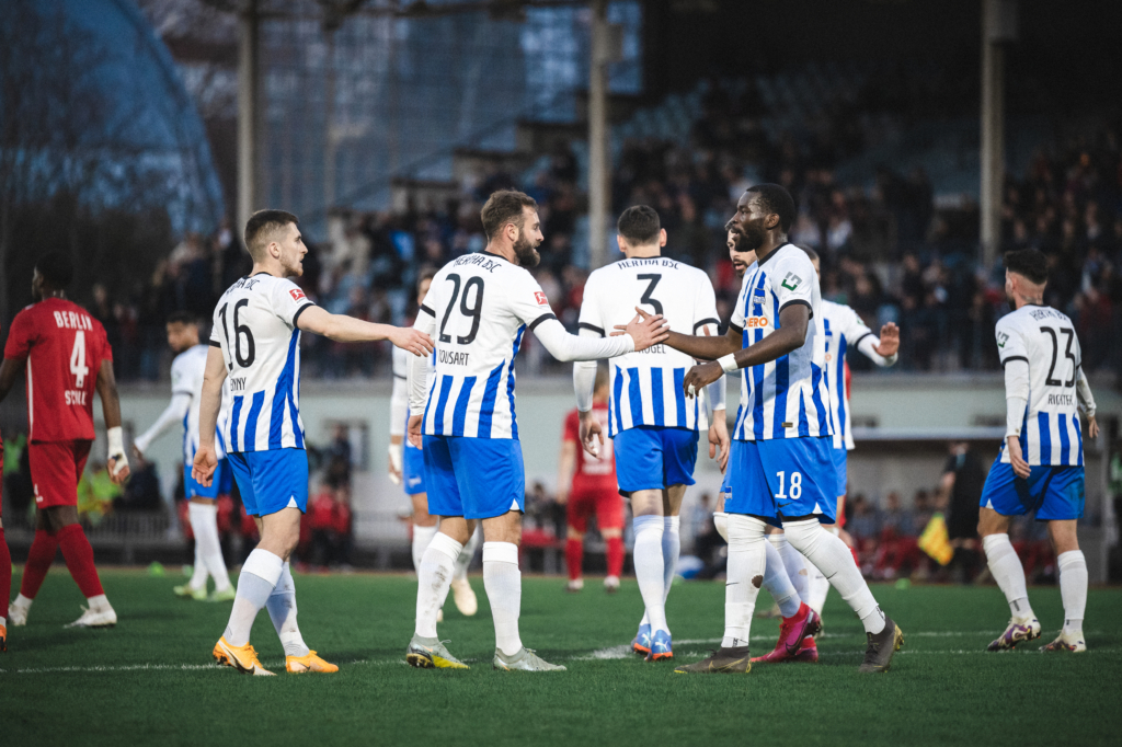 The Blue-Whites celebrate a Wilfried Kanga goal.