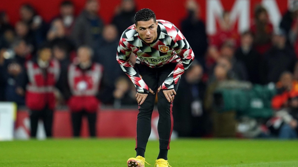 Man Utd striker Cristiano Ronaldo does some stretches