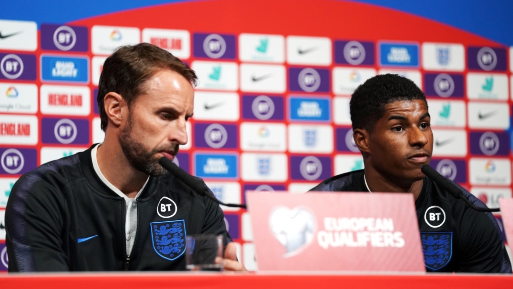 Marcus Rashford and Gareth Southgate during a press conference