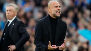 Pep Guardiola reacts in frustration during Man City's win over Real Madrid while Carlo Ancelotti watches on.