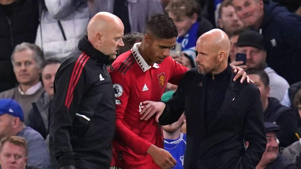 Man Utd defender Raphael Varane hugs Erik ten Hag