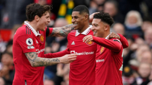 Manchester United's Marcus Rashford, centre, celebrates after scoring his side's second goal during the English Premier League soccer match between Manchester United and Leicester City at the Stamford Bridge stadium in Manchester, England