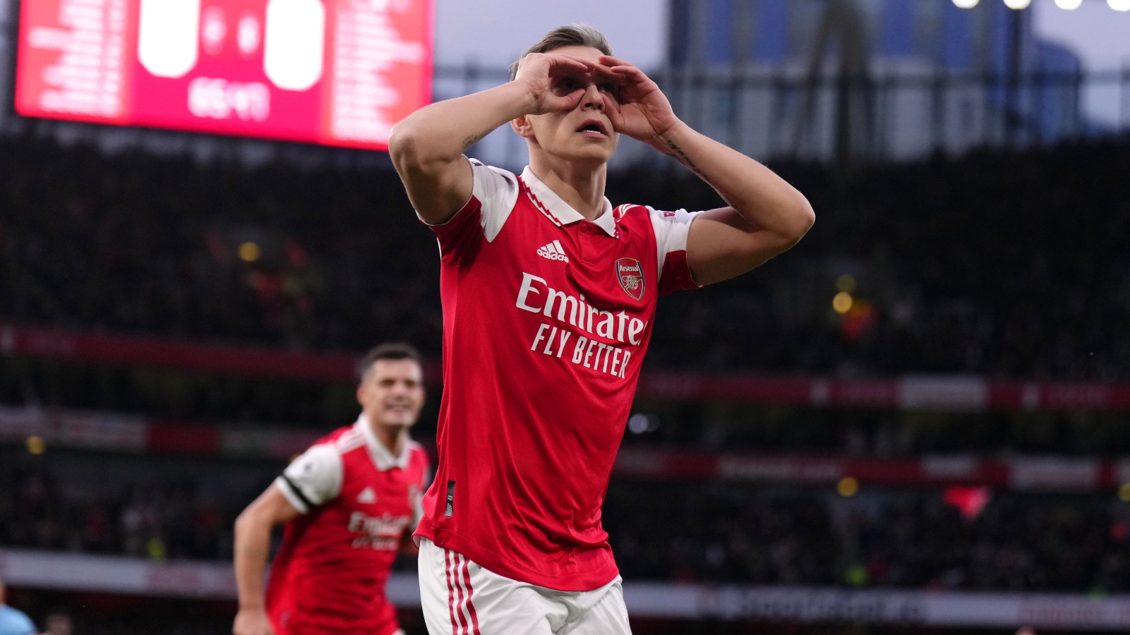 Leandro Trossard celebrates scoring the opening goal for Arsenal against Brentford.