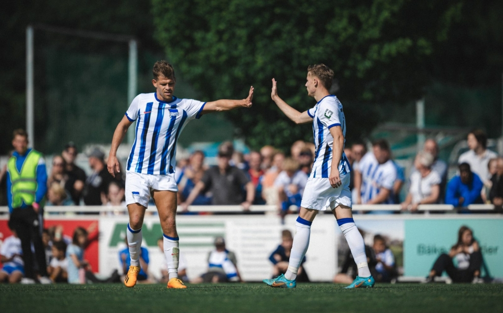 The Hertha players celebrate a goal in Stahnsdorf.