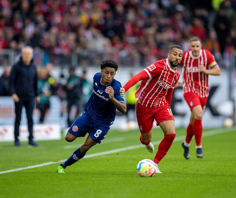 Leandro Barreiro and Daniel-Kofi Kyereh compete for the ball during the game earlier in the season.