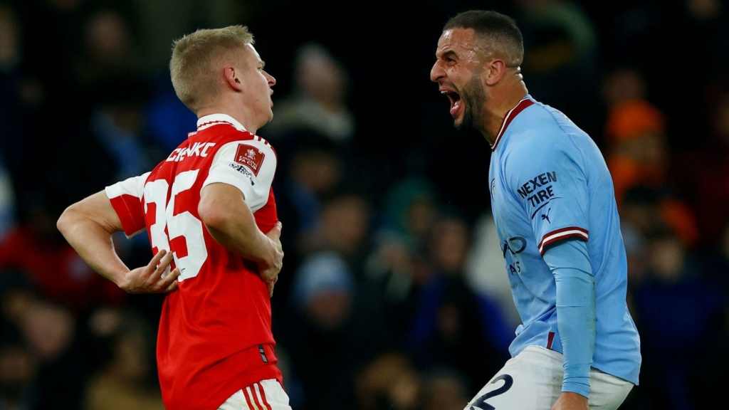 Arsenal defender Oleksandr Zinchenko is laughed at by Kyle Walker