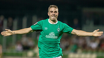 David Philipp cheering in an SV Werder shirt.