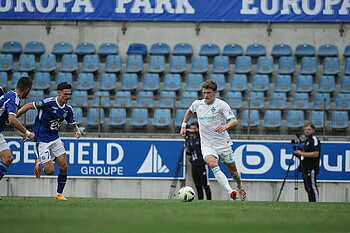 Jens Stage running with the ball at his feet