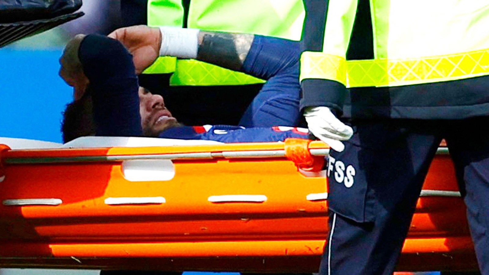 Neymar is stretchered off with an ankle injury