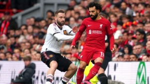 Man Utd defender Luke Shaw challenges Mo Salah