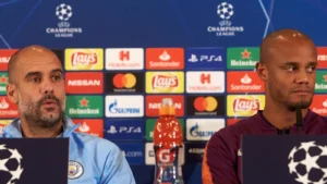 Pep Guardiola and Vincent Kompany during a press conference