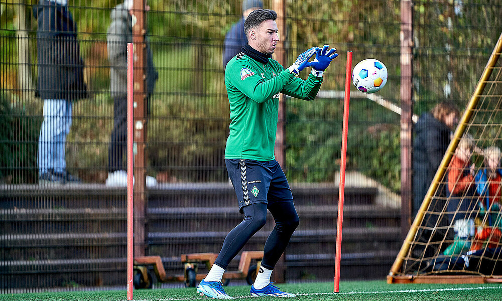 Jiri Pavlenka catching a ball at training.