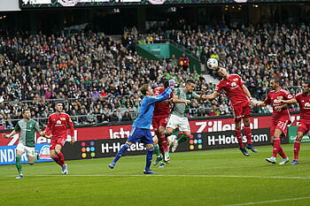 Union's Robin Knoche scoring an own goal with a header..