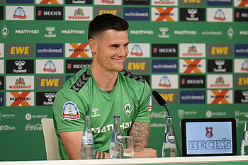 Michael Zetterer smiles at the press conference.