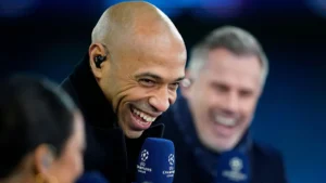 Soccer legend Thierry Henry is laughing on the pitch ahead of the Champions League round of 16 second leg soccer match between Manchester City and RB Leipzig at the Etihad stadium in Manchester, England,