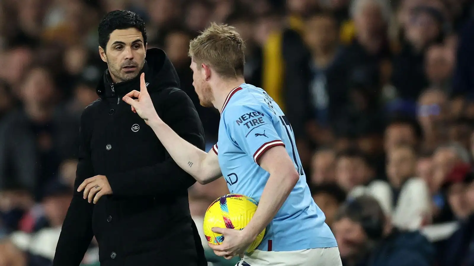 Arsenal manager Mikel Arteta is confronted by Kevin De Bruyne