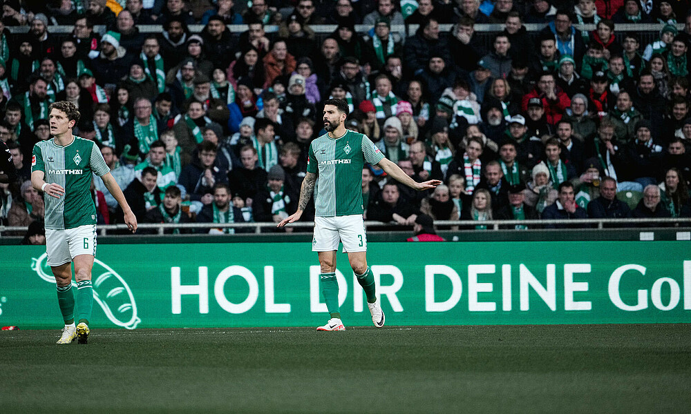 Anthony Jung standing on the pitch.