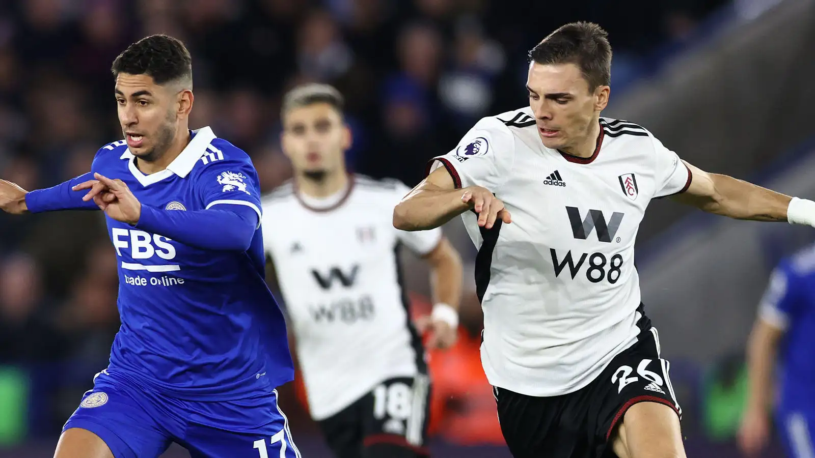 Ayoze Perez of Leicester City tussles with Joao Palhinha of Fulham during the Premier League match at the King Power Stadium, Leicester.