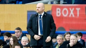 Sean Dyche watches a match from the toucline