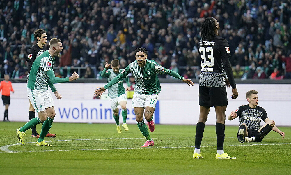 Justin Njinmah celebrating his goal that made it 2-1.