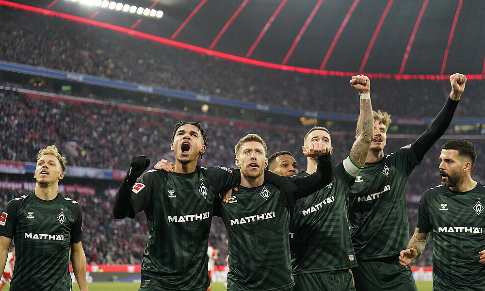 Werder celebrate Mitchell Weiser's goal.