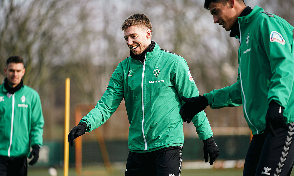 Weiser smiling in training gear.