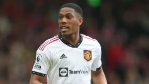 Man Utd forward Anthony Martial shouts to a team-mate