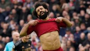 Liverpool forward Mo Salah reacts to missing a penalty