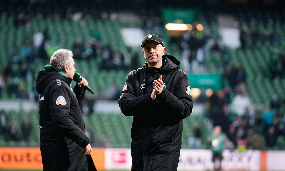 Ole Werner clapping.