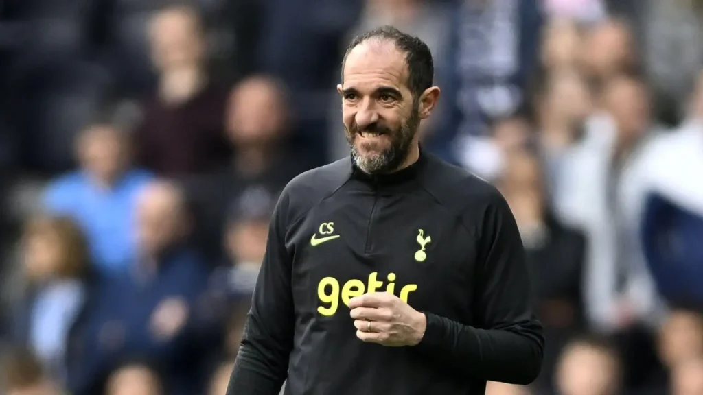 Spurs boss Cristian Stellini looks unsure while watching his team