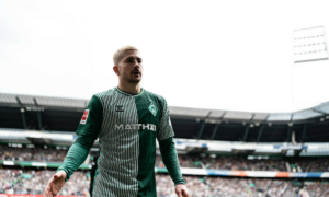 Romano Schmid wearing a Werder shirt leaving the pitch