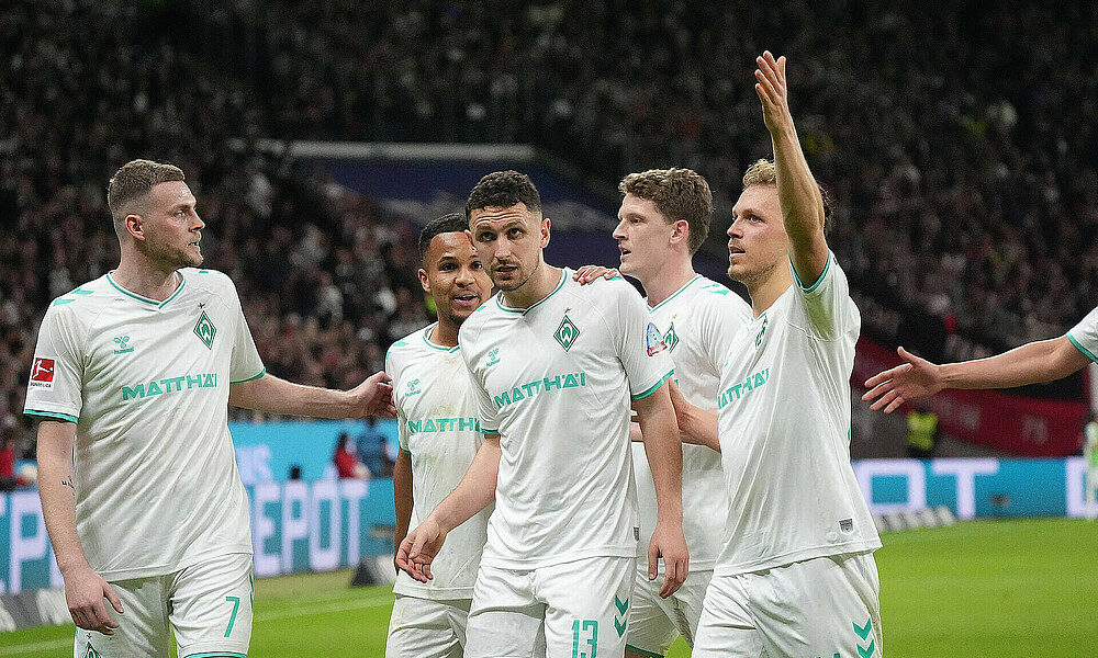 Milos Veljkovic celebrating in front of the away fans.