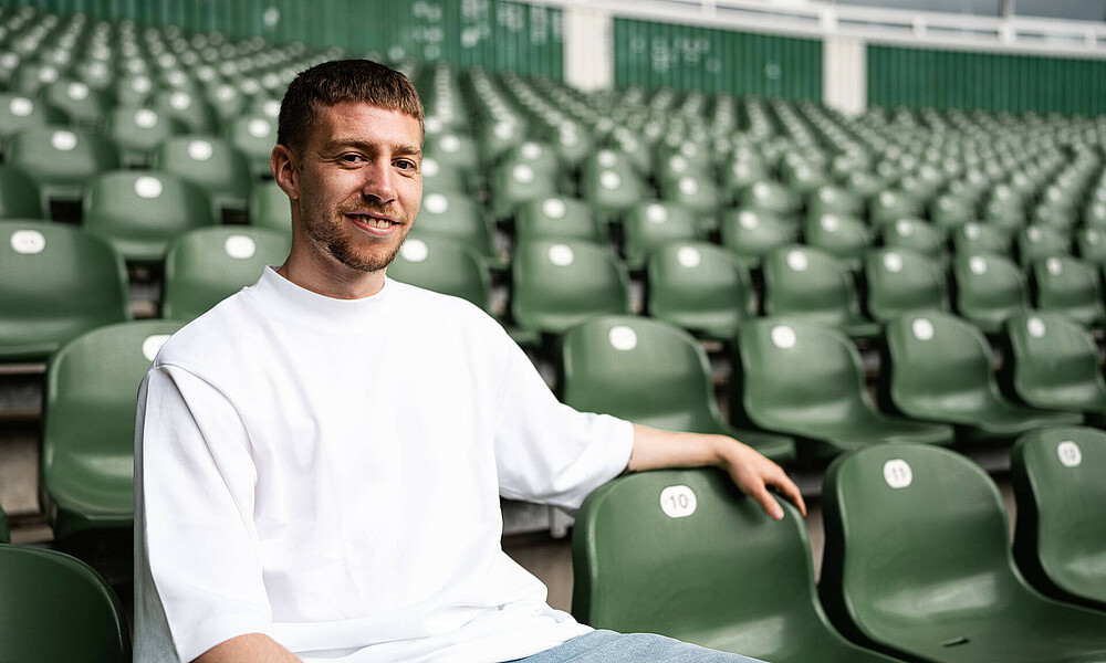 Mitchell Weiser sitting in the stadium.