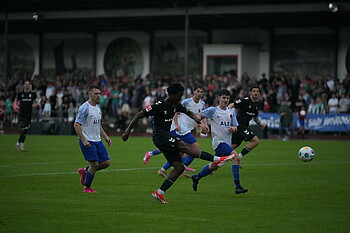 Wesley Adeh puts a cross in.