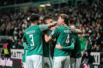 The team celebrates Niklas Stark's header against Augsburg.