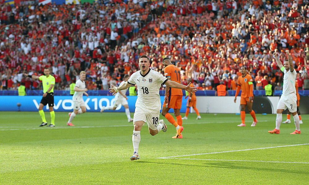 Romano Schmid celebrates his first goal for Austria.