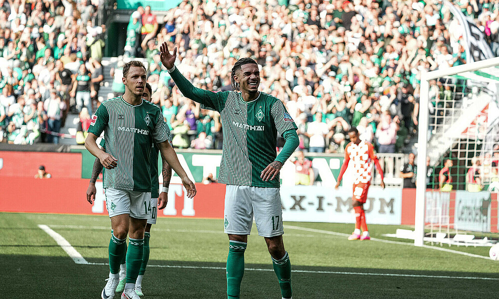 Justin Njinmah celebrates his first Bundesliga goal.