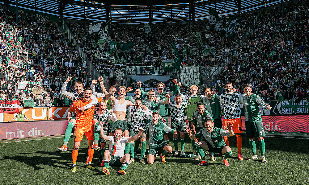 The team celebrate a 2-0 win over Augsburg.