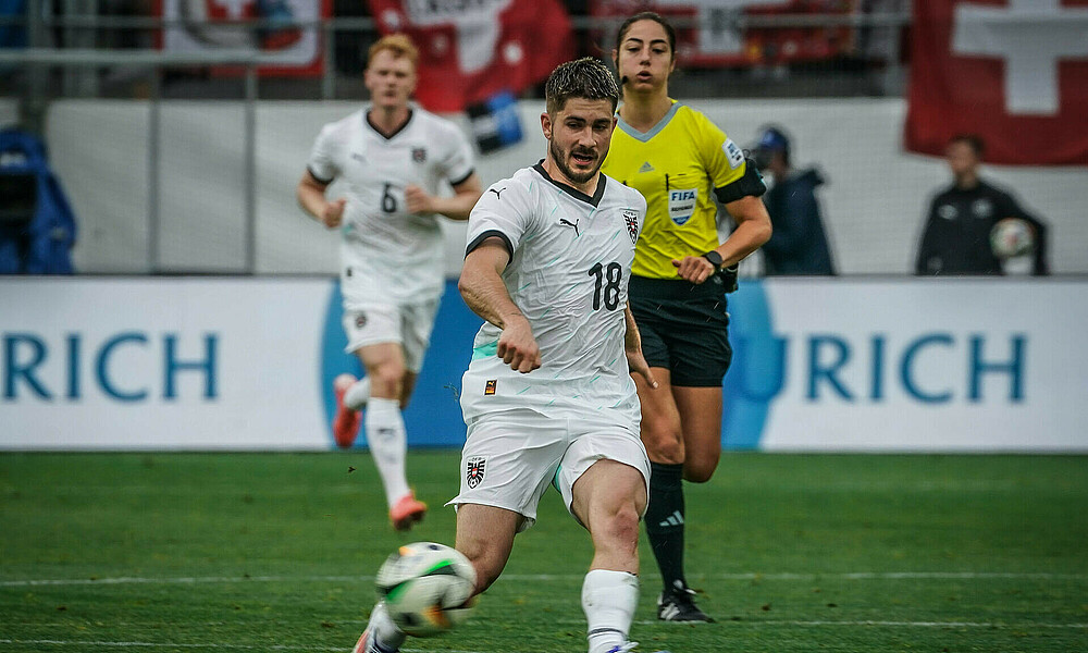 Romano Schmid in action for Austria.