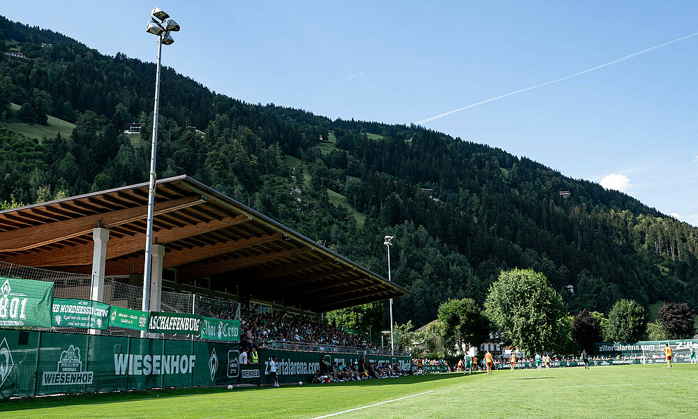 A picture of Werder fans sitting in the stands.