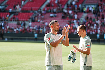 Milos Veljkovic applauds the fans.