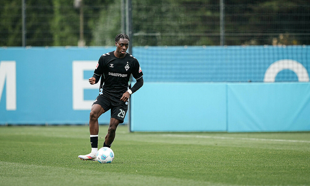 Dikeni Salifou with the ball during a pre-season match.