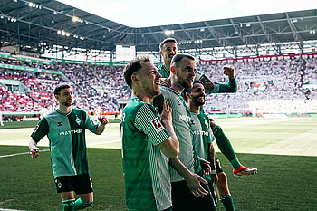 Senne Lynen, Marvin Ducksch and Leonardo Bittencourt celebrate at Augsburg last season.