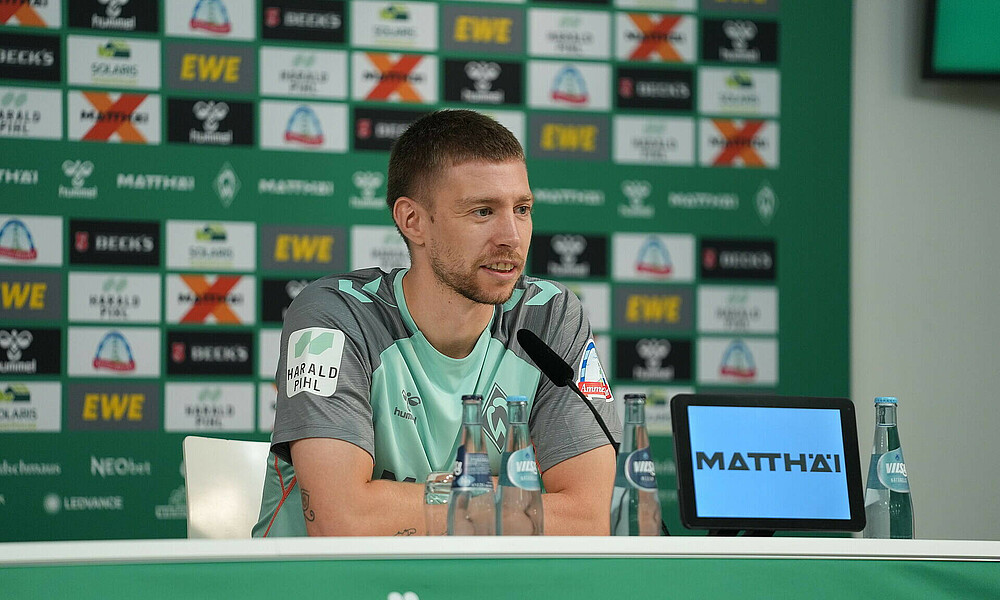 Mitchell Weiser sitting in the press conference room ahead of the game against Bayern.