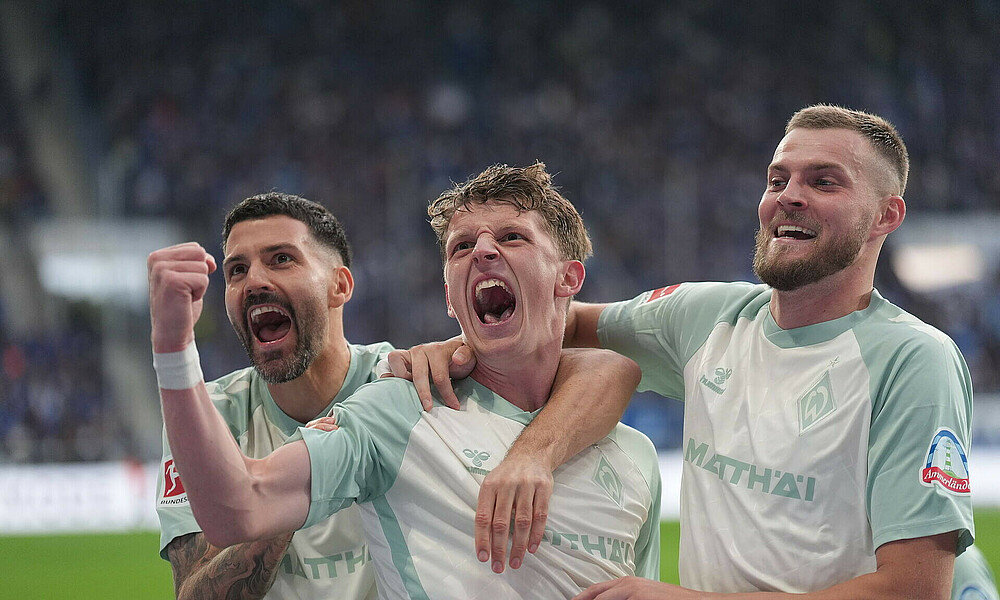 Jens Stage celebrates after completing his hat-trick.