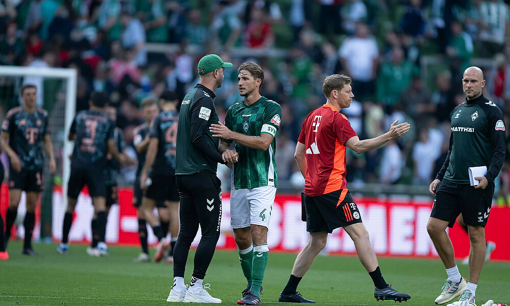 Ole Werner with Niklas Stark .